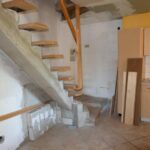 Wohnküche mit Treppe zum OG